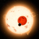 Kepler finds planets, like the smallest sphere here, by looking at suns until a dark spot passes over.